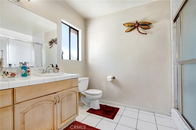 2061 W Redlands Blvd Unit 8C, Redlands, CA 92373 - bathroom with a shower stall, tile patterned floors, and vanity