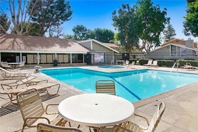 2061 W Redlands Blvd Unit 8C, Redlands, CA 92373 - community pool with a patio area and a hot tub