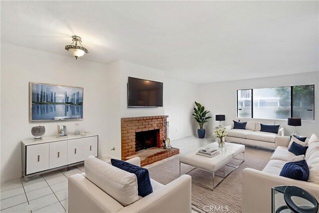 2061 W Redlands Blvd Unit 8C, Redlands, CA 92373 - living room with light tile patterned floors and a fireplace