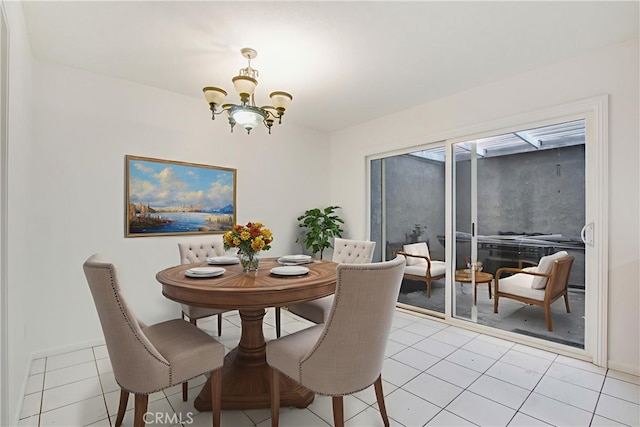 2061 W Redlands Blvd Unit 8C, Redlands, CA 92373 - dining room featuring a chandelier and light tile patterned floors