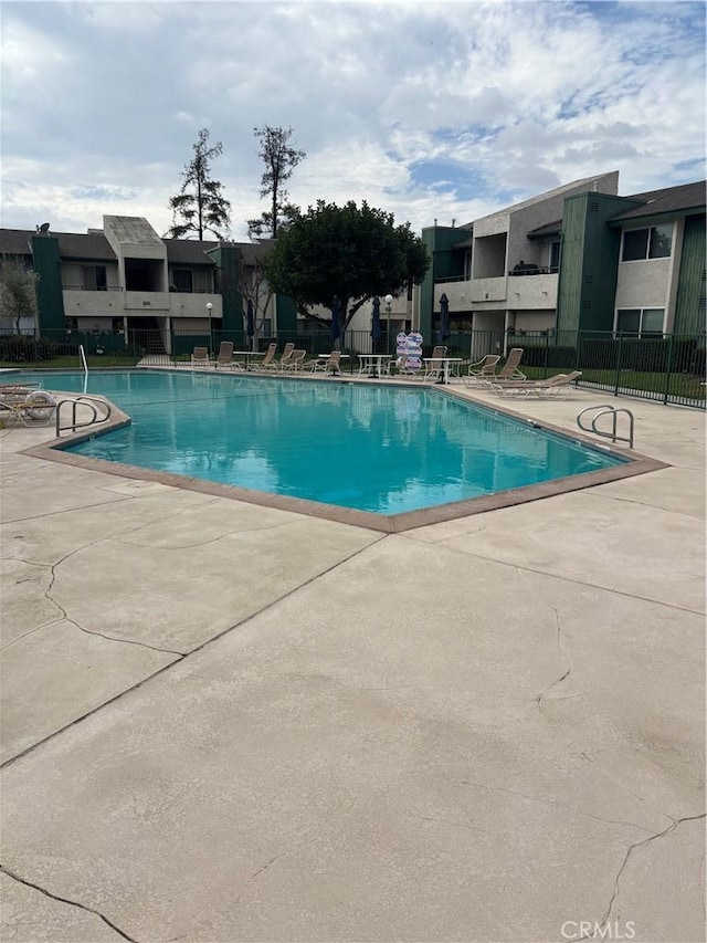 view of pool with a patio