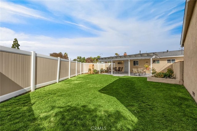 view of yard featuring a fenced backyard and a patio area