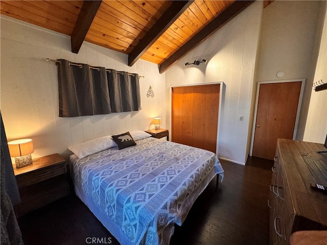 bedroom featuring lofted ceiling with beams, dark wood-type flooring, and wooden ceiling