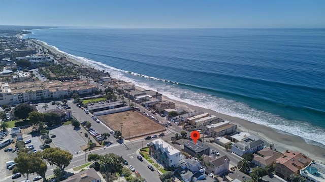 aerial view with a beach view and a water view