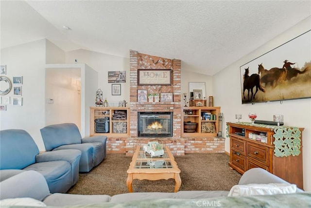 carpeted living room with vaulted ceiling, a textured ceiling, and a fireplace