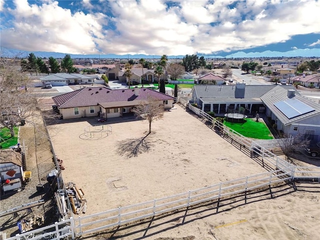 birds eye view of property with a residential view and a mountain view