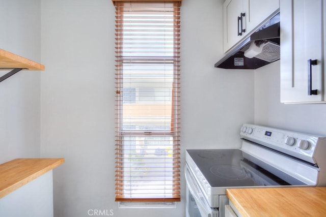 kitchen featuring white range with electric cooktop