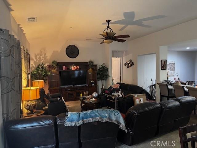 living room featuring ceiling fan