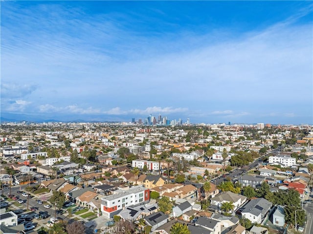 birds eye view of property featuring a city view