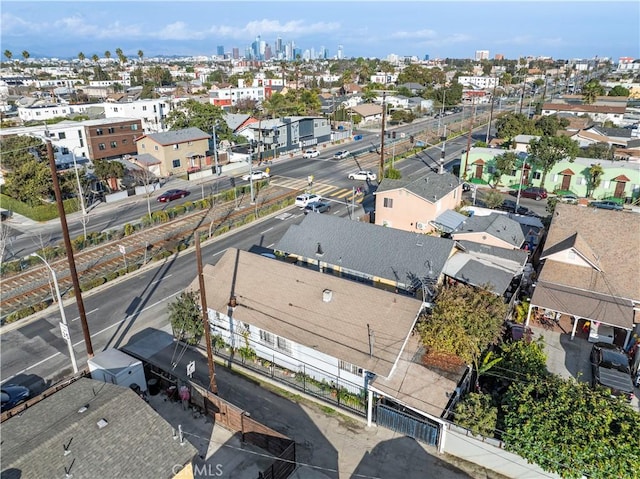 birds eye view of property with a view of city