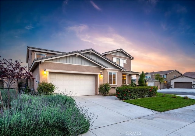 craftsman house with a garage