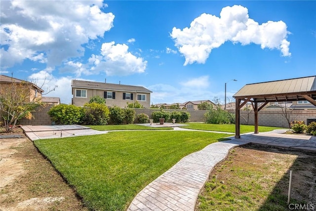 view of yard featuring a patio and a gazebo