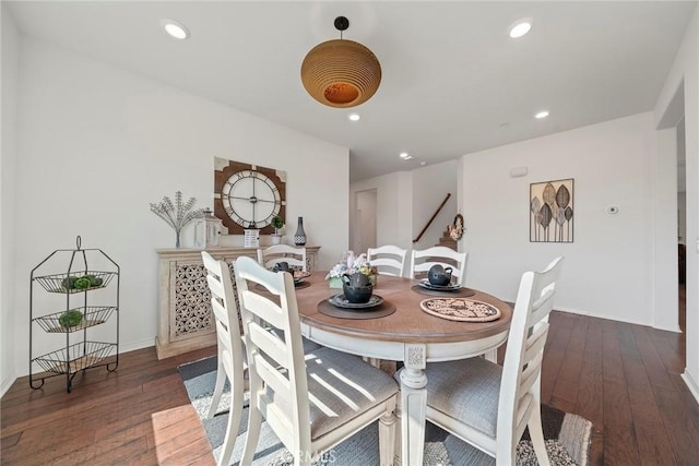 dining room with dark wood-type flooring