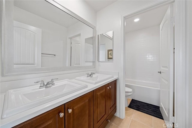 full bathroom with tile patterned flooring, shower / tub combination, vanity, and toilet