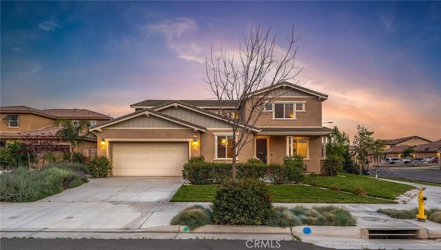 craftsman house featuring a garage