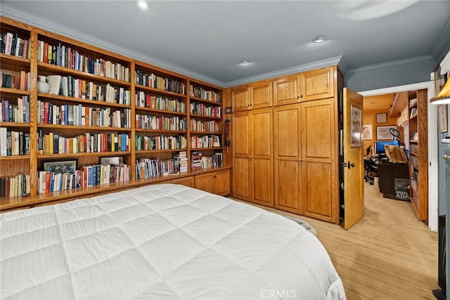 bedroom with light wood-style flooring, crown molding, and recessed lighting