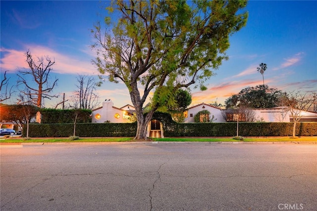 view of front of house with fence