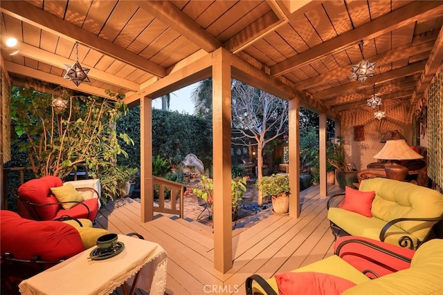 exterior space featuring wooden ceiling and vaulted ceiling with beams