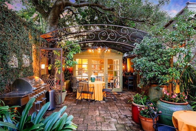 view of patio with french doors and grilling area