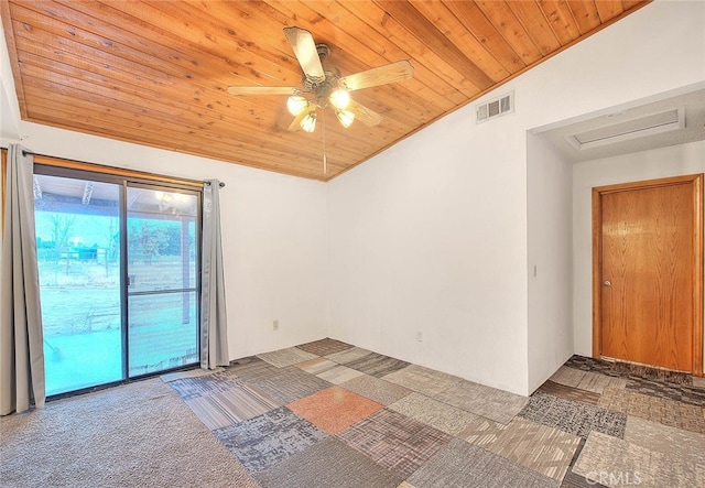 empty room featuring ceiling fan, wood ceiling, carpet, and lofted ceiling