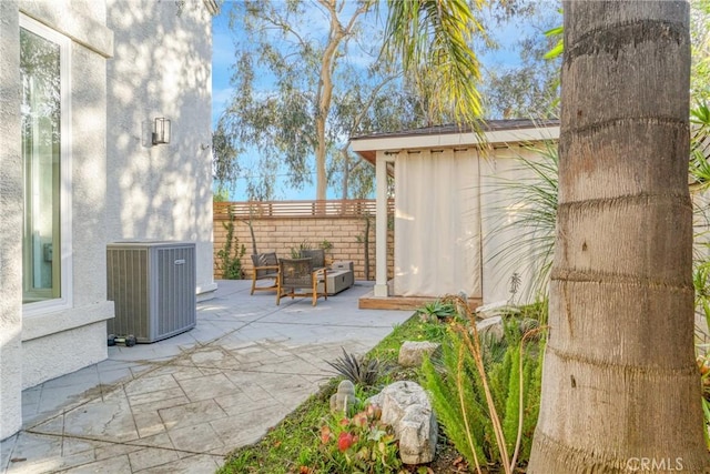 view of patio / terrace featuring central AC unit