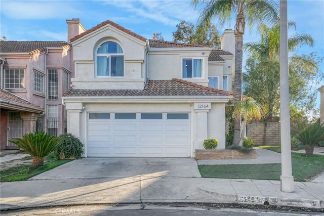 view of front of property with a garage