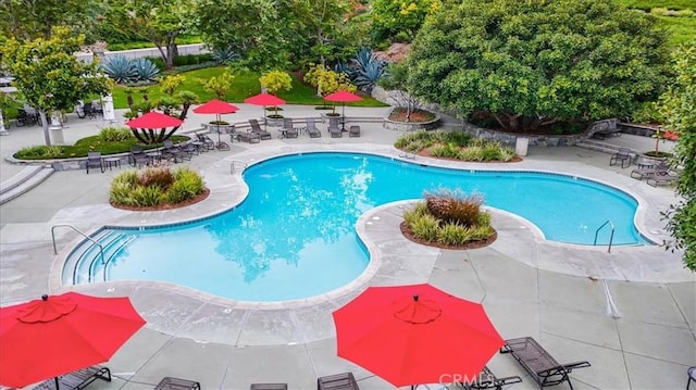 pool with a patio