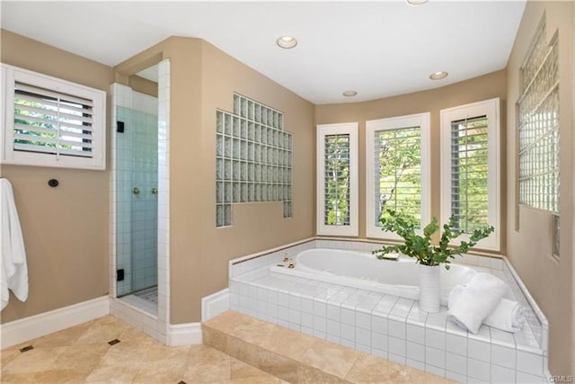 full bathroom featuring a bath, tile patterned flooring, a stall shower, baseboards, and recessed lighting