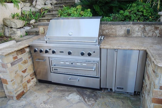 exterior space with a grill