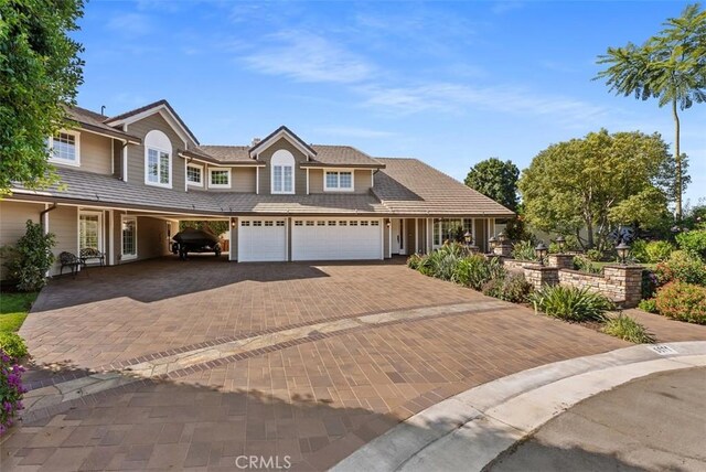 5571 Clover Hill Dr, Yorba Linda, CA 92886 - view of front of house featuring decorative driveway