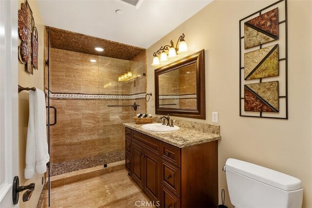 5571 Clover Hill Dr, Yorba Linda, CA 92886 - full bath with vanity, toilet, wood finished floors, and a tile shower