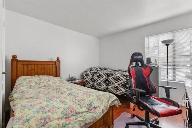 bedroom featuring hardwood / wood-style floors