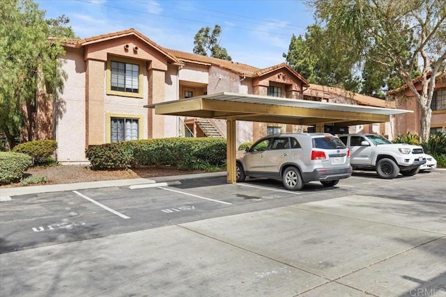 12059 Alta Carmel Ct Unit 167, San Diego, CA 92128 - view of partially covered parking lot