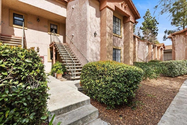 12059 Alta Carmel Ct Unit 167, San Diego, CA 92128 - view of exterior entry featuring stucco siding