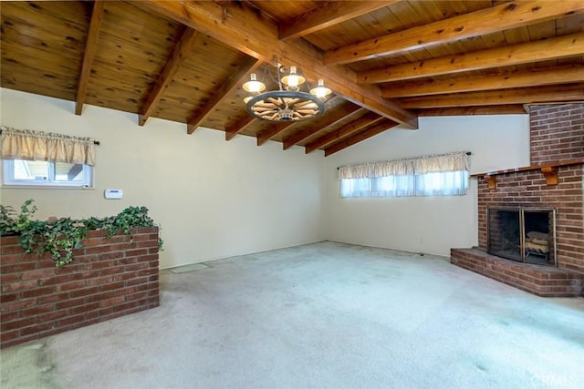 unfurnished living room featuring wood ceiling, carpet floors, a brick fireplace, and vaulted ceiling with beams