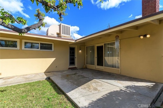 doorway to property featuring a patio