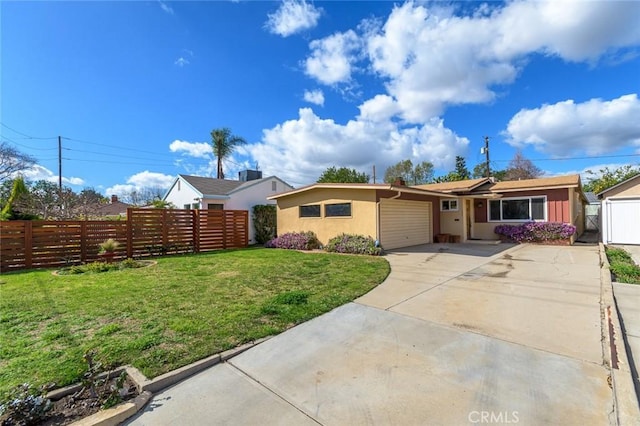 view of front facade featuring a front lawn and a garage