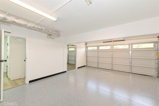 garage with baseboards