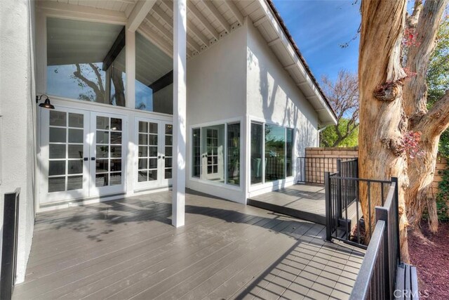 wooden terrace featuring french doors