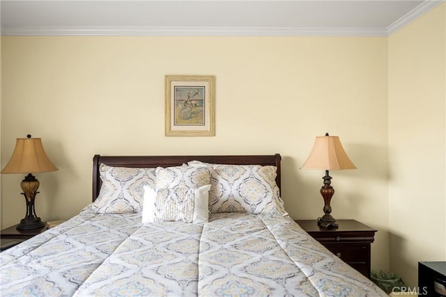 bedroom featuring crown molding