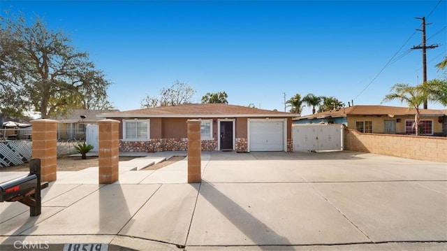 single story home with a garage