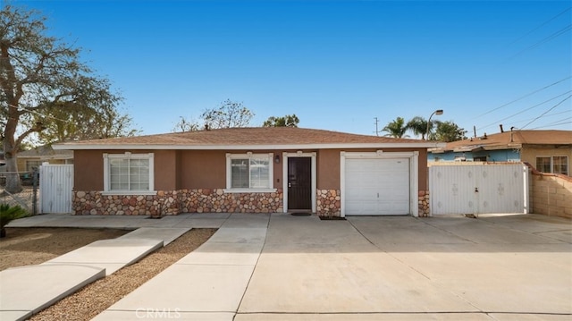 ranch-style home with a garage