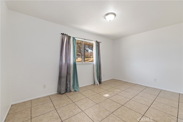 view of tiled spare room