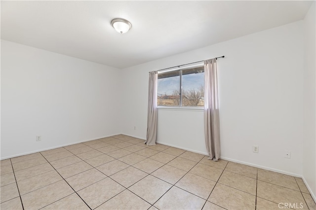 view of tiled spare room