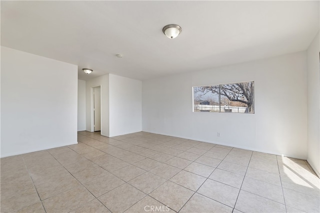 view of tiled spare room