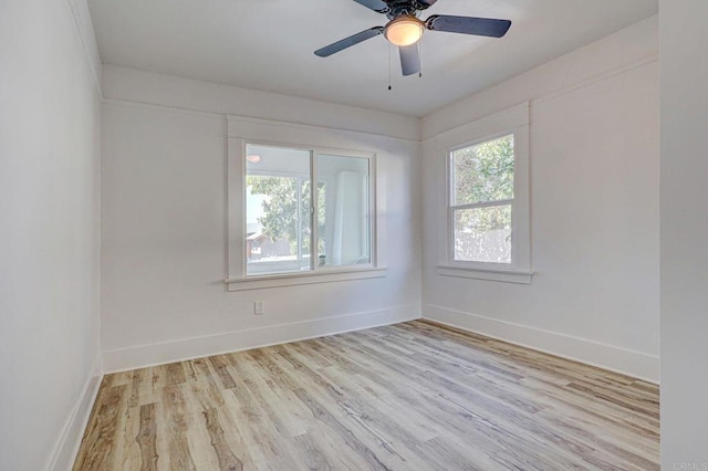 unfurnished room with ceiling fan and light hardwood / wood-style flooring