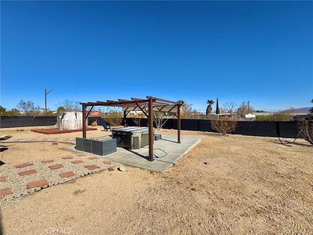 view of yard featuring a patio and a pergola