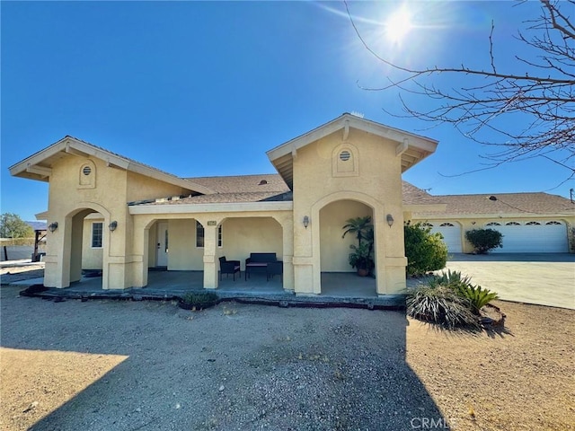 view of front of property featuring a garage