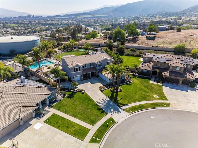 bird's eye view with a residential view and a mountain view