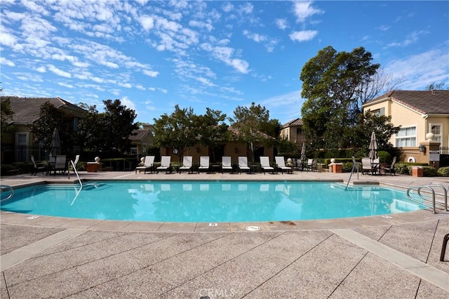 community pool featuring a patio